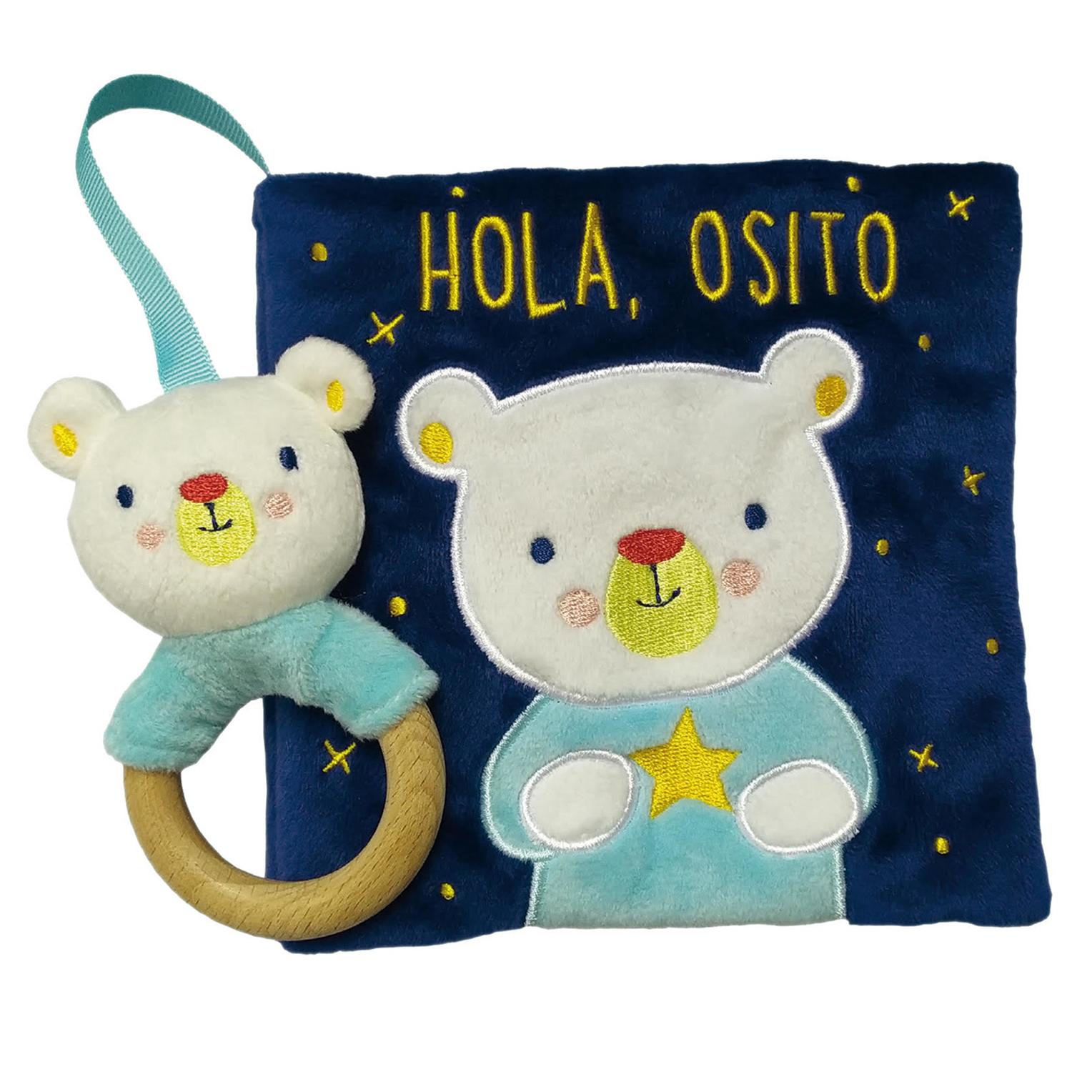 Hola, Osito. Libro De Tela Combel Libro x 1 HOLA, OSITO libro de tela CombelżQué hace hoy osito? Un libro de tela con cubiertas de terciopelo y un sonajero para compartir durante las rutinas diarias de los más pequeños. Una compañía ideal para 